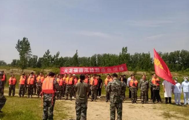 火龍鎮(zhèn)開展防汛搶險應急演練,錘煉實戰(zhàn)本領(lǐng)
